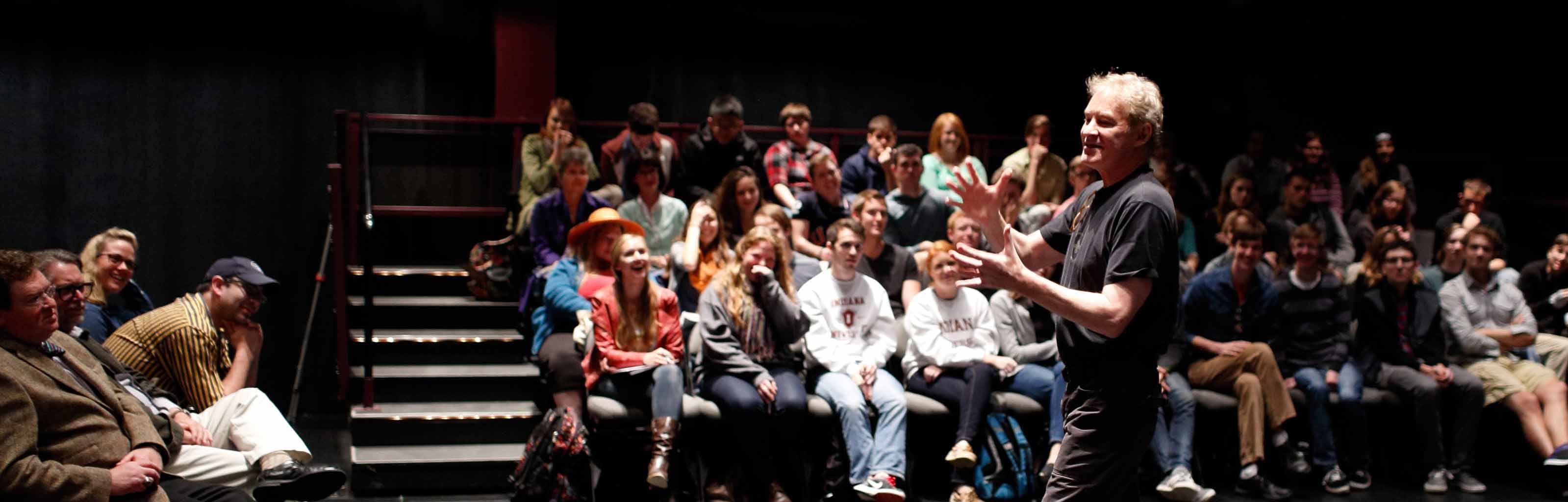 IU alumnus speaks to a group.